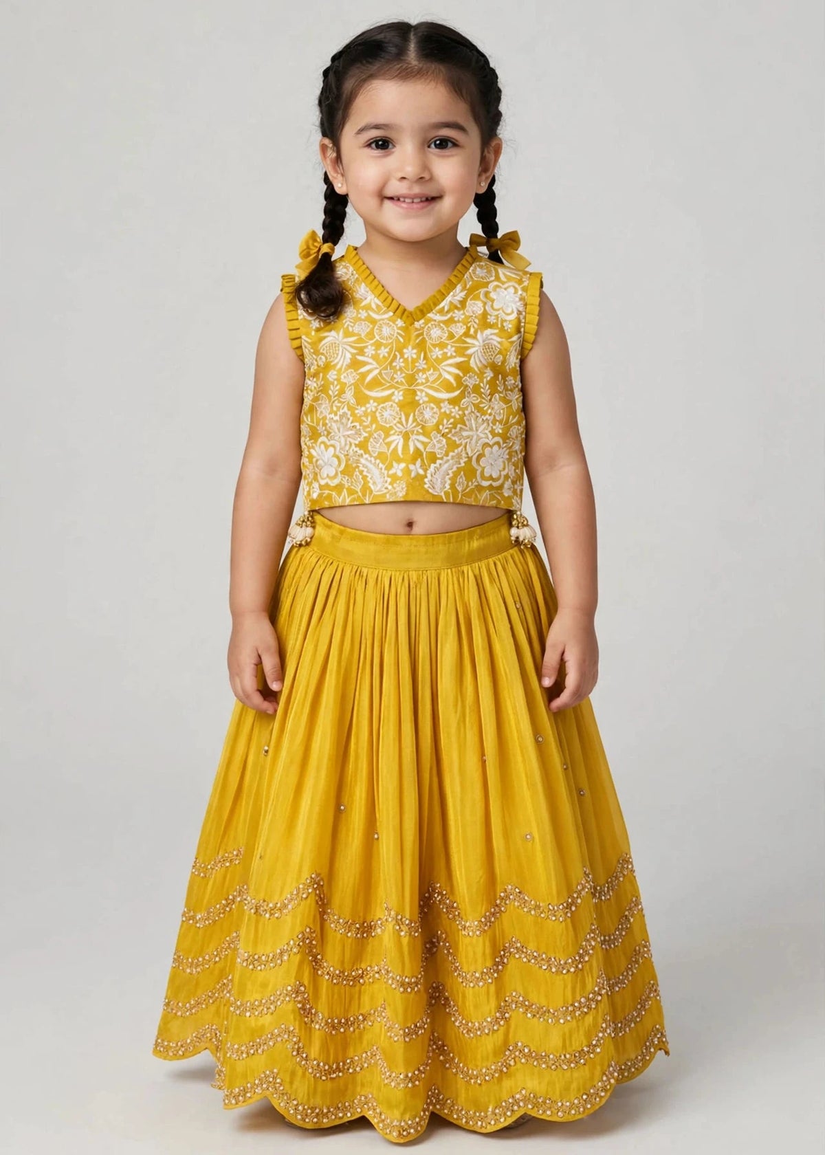 Yellow lehenga with zari thread and pearl embroidery for girls, kids wedding and festive wear by Reev