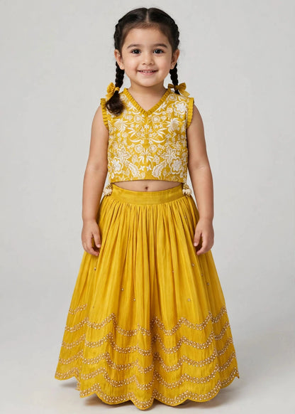 Yellow lehenga with zari thread and pearl embroidery for girls, kids wedding and festive wear by Reev